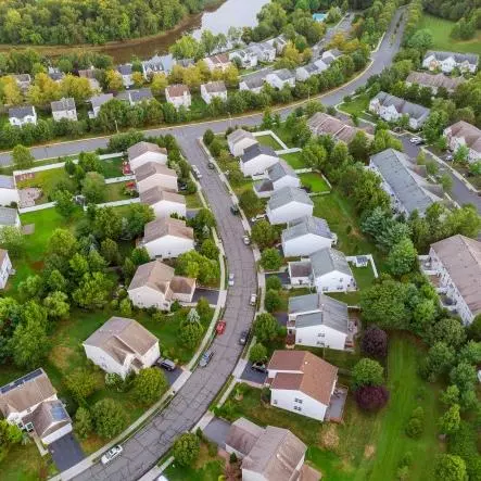 aerial view suburban homes roads early sunrise 73110 6293